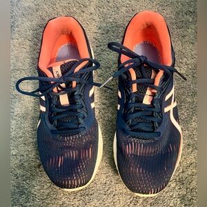ASICS women’s size 8 dark blue and coral running/athletic shoes. Gel-Pulse 11.